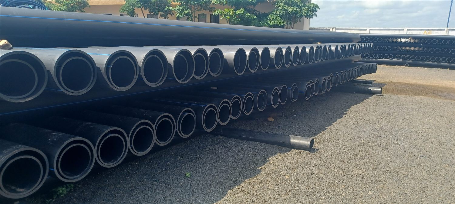 Stacked HDPE pipes at the Aquatic Pipes yard, Rajgarh